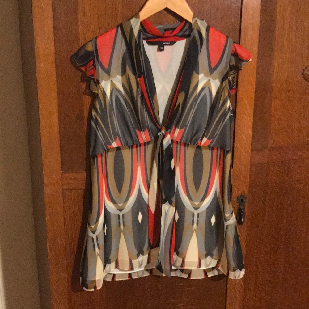 Liquid deep-V sleeveless top